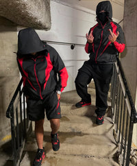 SYNA WORLD VORTEX WOVEN JACKET - BLACK / RED